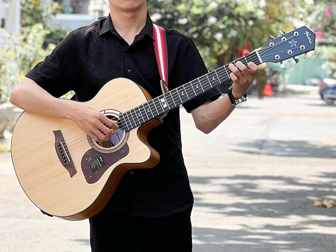 guitar mantic gt 10ac anh thuc te 1
